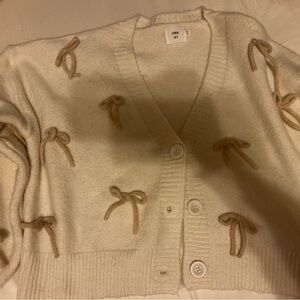 Luxe Cream Cardigan with Tan Bow Accents